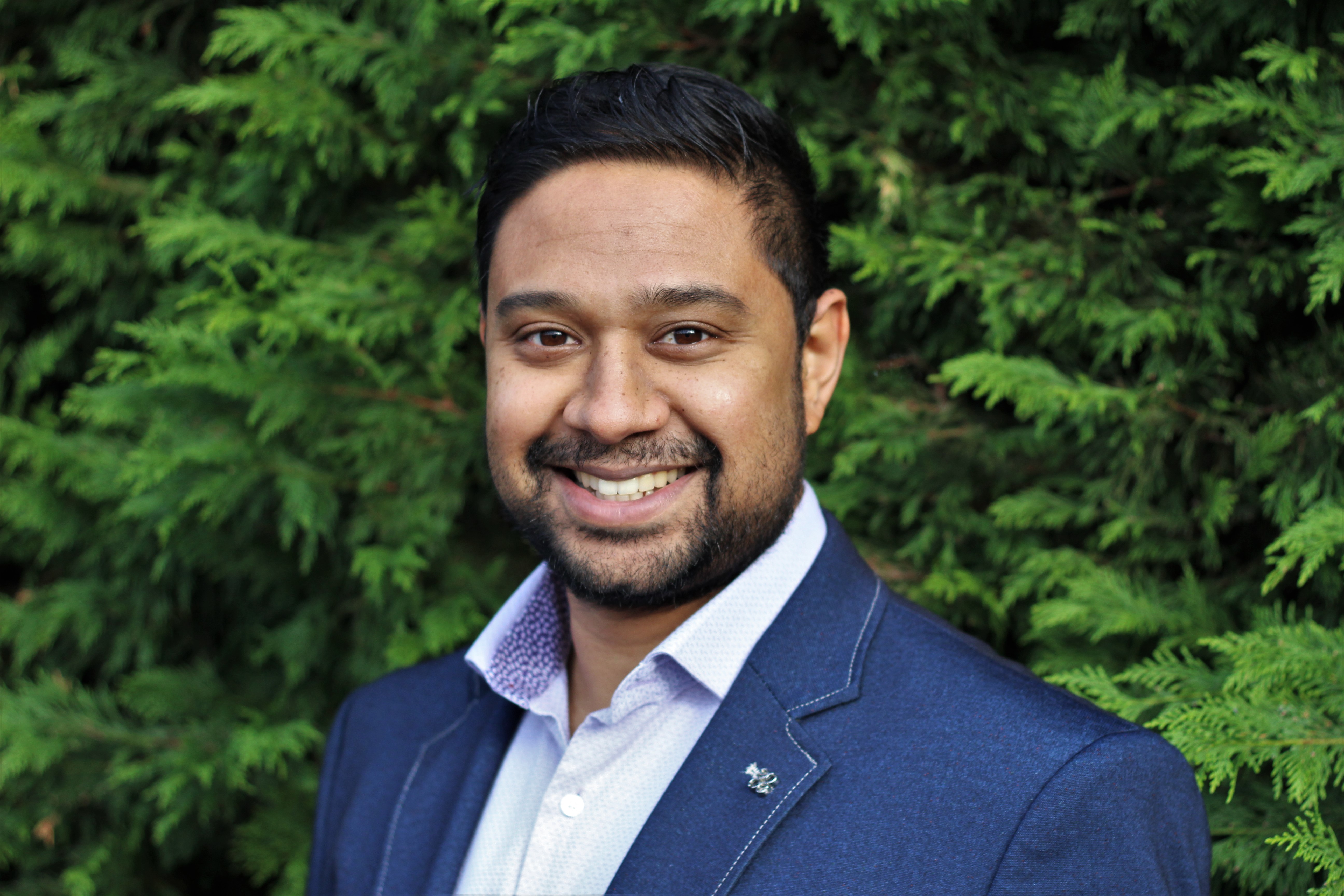 Ross Ramgobin — colour portrait